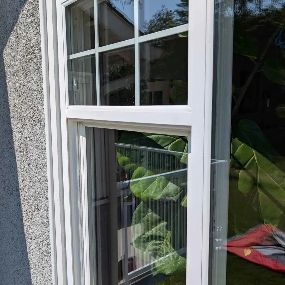 Spotless, crystal-clear window after professional cleaning in Duncan, reflecting natural light perfectly.