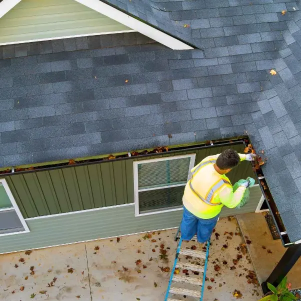 How to Easily and Safely Clean Your Gutters With a Pressure Washer.webp